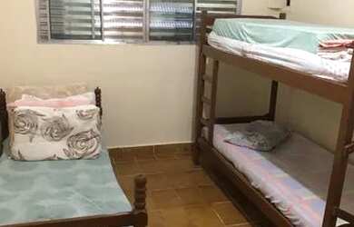 Imagem: A casa possui 2 Dormitórios, 1 Banheiro, 1 Vaga na garagem