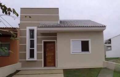 Imagem: A casa possui 3 Dormitórios, 2 Banheiros, 2 Vagas na garagem