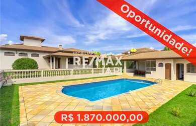 Imagem: A casa em condomínio possui 4 Dormitórios, 4 Banheiros, 406m²