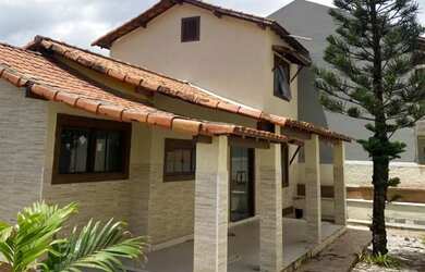 Imagem: A casa possui 2 Dormitórios, 2 Banheiros, 3 Vagas na garagem