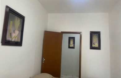 Imagem: A casa possui 2 Dormitórios, Acomodam 12 pessoas e 1 Vaga na