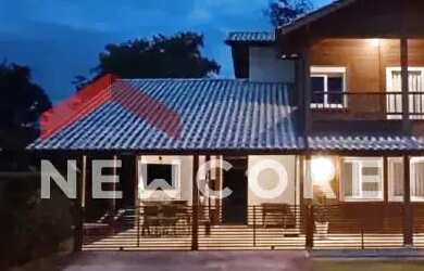 Imagem: A casa em condomínio possui 3 Dormitórios, 4 Banheiros, 2