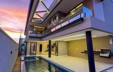 Imagem: A casa em condomínio possui 4 Dormitórios, 5 Banheiros, 4