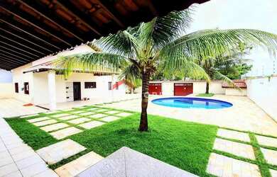 Imagem: A casa possui 3 Dormitórios, 3 Banheiros, 5 Vagas na garagem