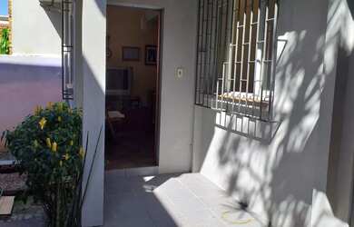 Imagem: A casa possui 3 Dormitórios, 3 Banheiros, 3 Vagas na garagem