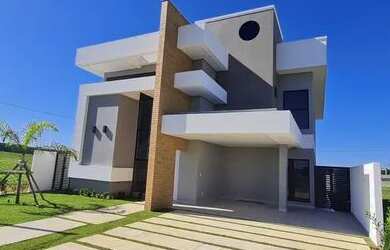 Imagem: A casa em condomínio possui 4 Dormitórios, 5 Banheiros, 2