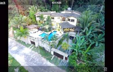 Imagem: A casa em condomínio possui 5 Dormitórios, 5 Banheiros, 5