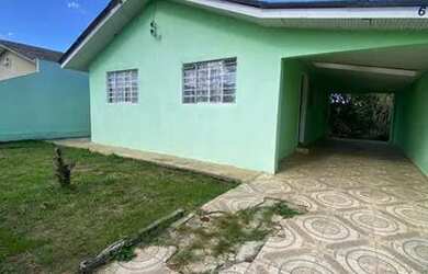 Imagem: A casa possui 3 Dormitórios, 1 Banheiro, 1 Vaga na garagem