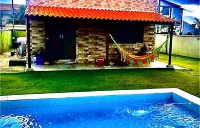 Imagem: A casa possui 3 Dormitórios, 4 Vagas na garagem e está localizado