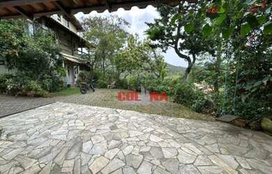 Imagem: A casa possui 2 Dormitórios, 1 Banheiro, 1 Vaga na garagem