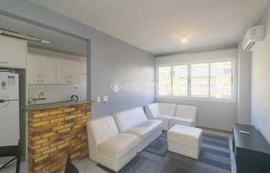 Imagem: O apartamento possui 1 Dormitório, 1 Banheiro, 1 Vaga na garagem