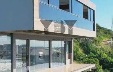 Imagem: A casa possui 2 Dormitórios, 3 Banheiros, 2 Vagas na garagem