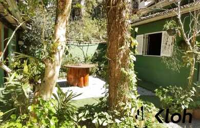 Imagem: A casa possui 5 Dormitórios, 2 Banheiros, 1 Vaga na garagem