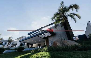 Imagem: A casa em condomínio possui 4 Dormitórios, 5 Banheiros, 5