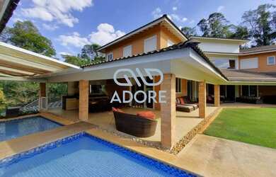 Imagem: A casa em condomínio possui 5 Dormitórios, 5 Banheiros, 5