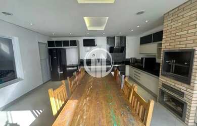 Imagem: A casa em condomínio possui 4 Dormitórios, 4 Banheiros, 3