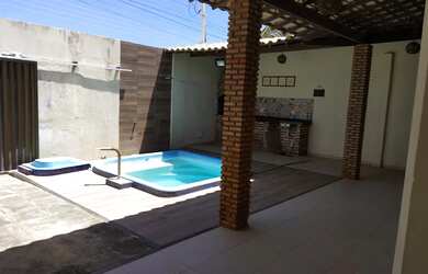 Imagem: A casa possui 3 Dormitórios, 3 Banheiros, 4 Vagas na garagem