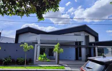 Imagem: A casa possui 3 Dormitórios, 4 Banheiros, 4 Vagas na garagem