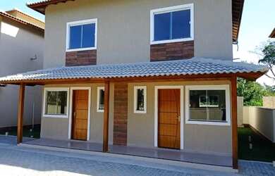 Imagem: A casa possui 2 Dormitórios, 2 Banheiros, 1 Vaga na garagem