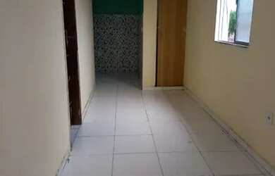 Imagem: A casa possui 2 Dormitórios e 1 Banheiro e está localizado