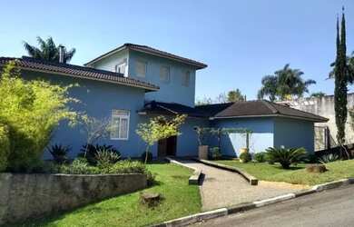 Imagem: A casa em condomínio possui 4 Dormitórios, 5 Banheiros, 5