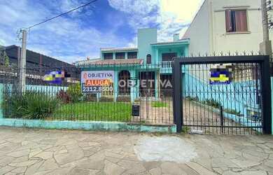 Imagem: A casa possui 4 Dormitórios, 2 Banheiros, 4 Vagas na garagem