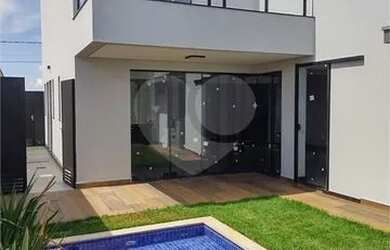 Imagem: A casa em condomínio possui 4 Dormitórios, 5 Banheiros, 4