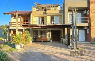 Imagem 2: Casa em Porto Alegre, no bairro Hípica, com 3 dormitório s , e 3 banheiros,...