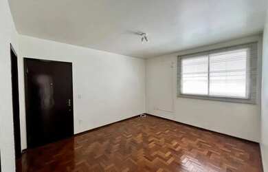 Imagem: O apartamento possui 1 Dormitório, 1 Banheiro, 1 Vaga na garagem