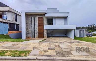 Imagem: A casa em condomínio possui 3 Dormitórios, 4 Banheiros, 2