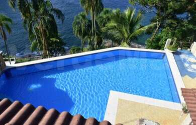 Imagem 6: Casa à Venda no Morro do Sorocotuba em Guarujá, praia do Éden
