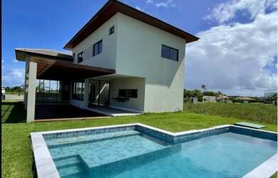 Imagem: A casa em condomínio possui 5 Dormitórios, 5 Banheiros, 4