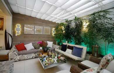 Imagem: A casa possui 4 Dormitórios, 4 Banheiros, 3 Vagas na garagem