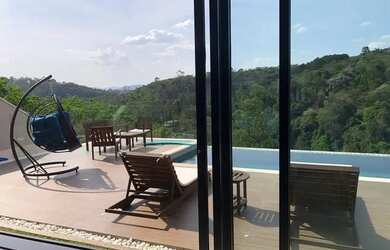 Imagem: A casa em condomínio possui 4 Dormitórios, 5 Banheiros, 5