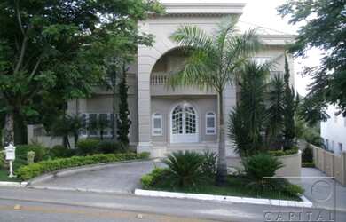 Imagem: A casa em condomínio possui 4 Dormitórios, 5 Banheiros, 5