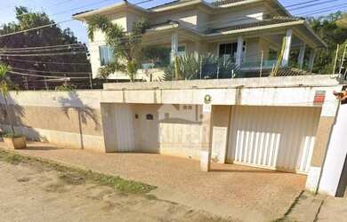 Imagem: A casa possui 4 Dormitórios, 4 Banheiros, 4 Vagas na garagem