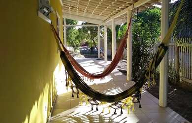 Imagem: A casa possui 3 Dormitórios, 2 Banheiros e 2 Vagas na garagem