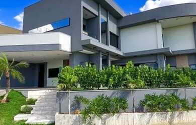 Imagem: A casa em condomínio possui 4 Dormitórios, 5 Banheiros, 5