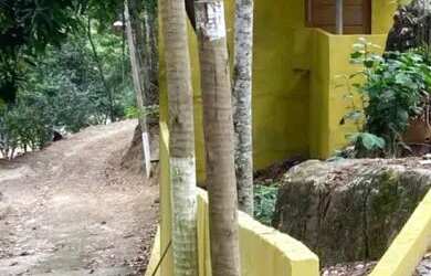 Imagem: A casa possui 2 Dormitórios, 1 Banheiro, 1 Vaga na garagem