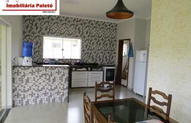 Imagem 12: Sobrado a venda no Ninho Verde, frente ao asfalto e lago do condomínio...