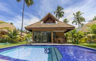 Imagem: A casa possui 3 Dormitórios, 2 Vagas na garagem e está localizado