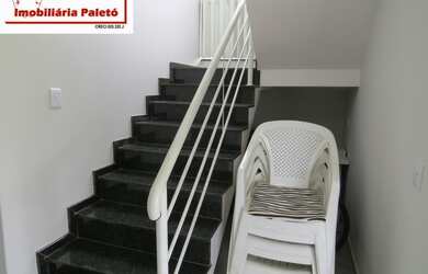 Imagem 13: Sobrado a venda no Ninho Verde, frente ao asfalto e lago do condomínio...