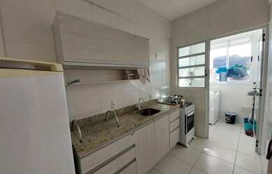 Imagem: A casa possui 2 Dormitórios, 1 Banheiro, 2 Vagas na garagem