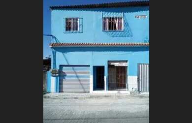 Imagem: A casa possui 5 Dormitórios, 2 Banheiros, 1 Vaga na garagem