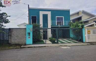 Imagem: A casa possui 4 Dormitórios, 4 Banheiros, 4 Vagas na garagem