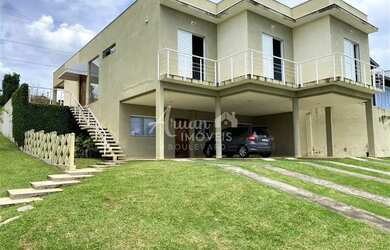 Imagem: A casa em condomínio possui 3 Dormitórios, 4 Banheiros, 5