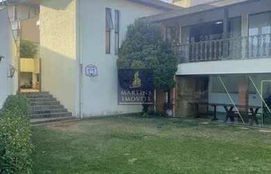 Imagem: A casa possui 4 Dormitórios, 3 Banheiros, 4 Vagas na garagem