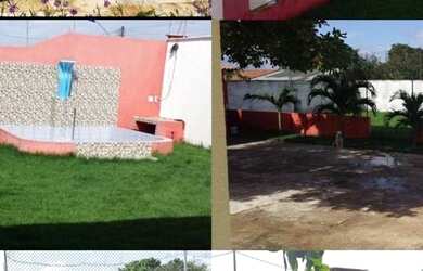 Imagem: A casa possui 2 Dormitórios, 5 Vagas na garagem e está localizado