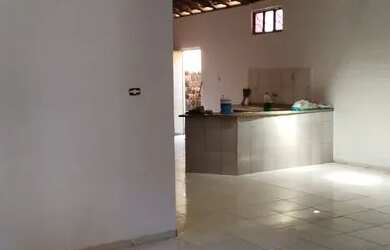 Imagem: A casa possui 3 Dormitórios, 3 Vagas na garagem e está localizado