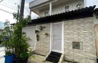 Imagem: A casa possui 2 Dormitórios, 2 Banheiros, 2 Vagas na garagem